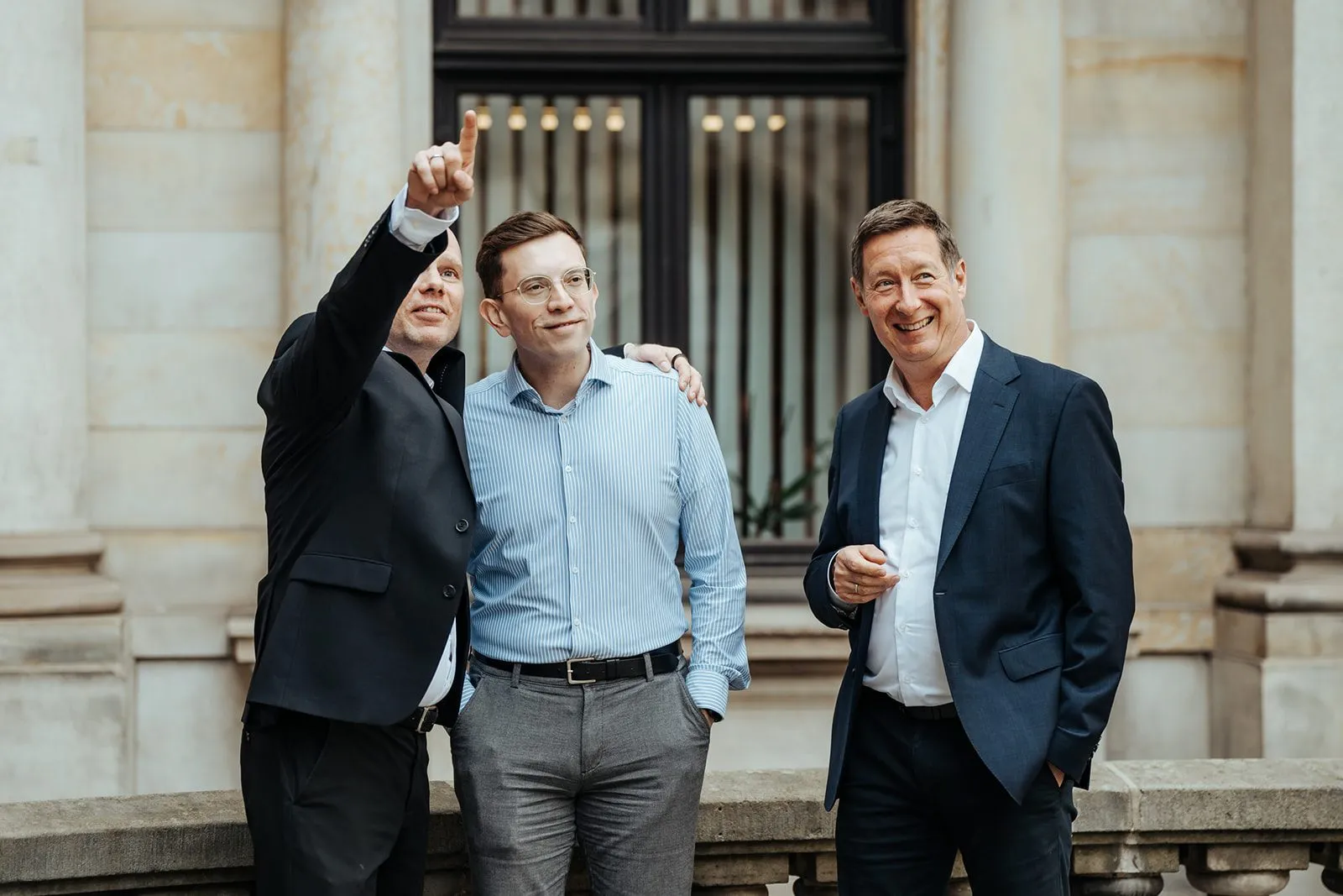 Team in front of the office